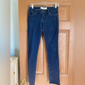 Abercrombie & Fitch low-rise, dark wash skinny jeans.